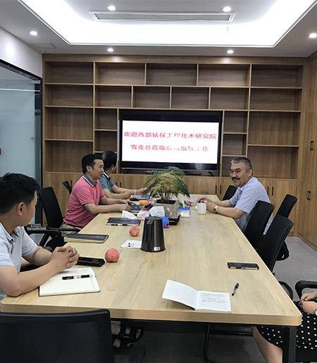 西部钻探工程技术钻研院雪克总到我公司进行互换领导